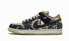 running in a dune area shoes jogging footwear Nike SB Dunk Low Travis Scott