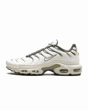 running in a ferry terminal area shoes compression foam Nike Air Max Plus Phantom Cargo Khaki